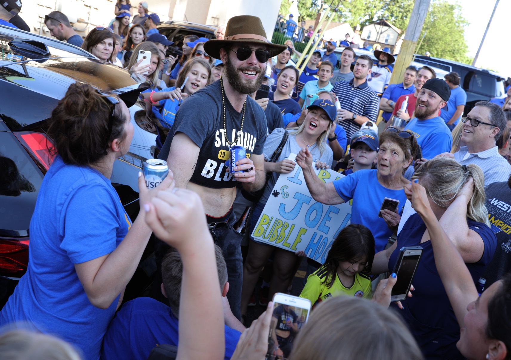 Joel Edmundson celebrates with Blues fans